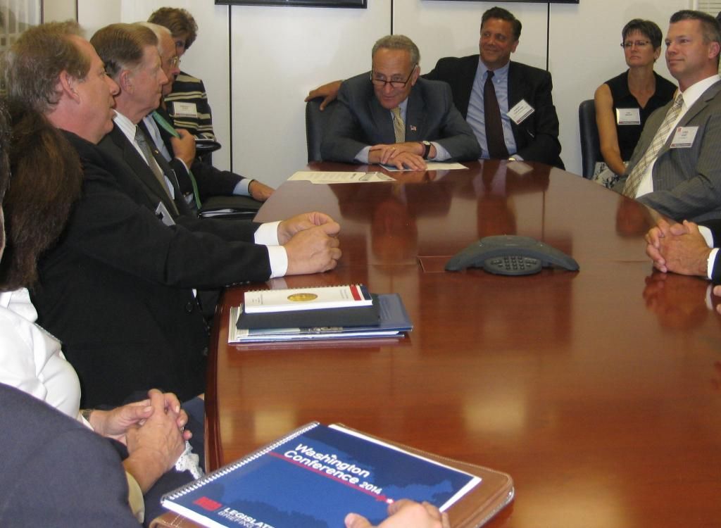 Bruce Bendell, owner of Major World, chats with Senator Charles Schumer in the Senator's Conference Room. 9/10/14.